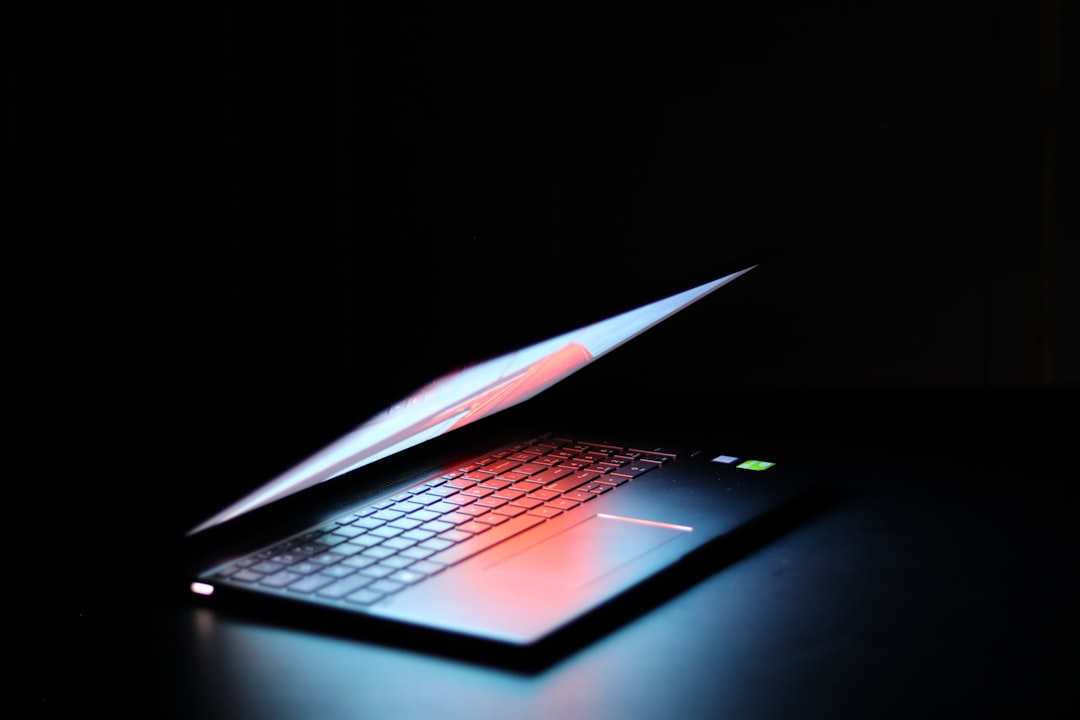 Professional reviewing website speed for local service businesses on a laptop
